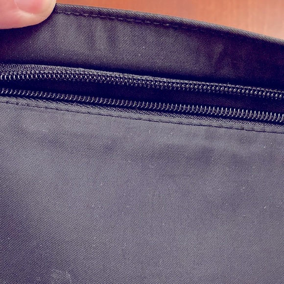 CHANEL TOILETRIES BAG. BLACK. CHANEL PRINTED IN RAISED LETTERS. HAS HANDLE. EUC - Picture 5 of 10